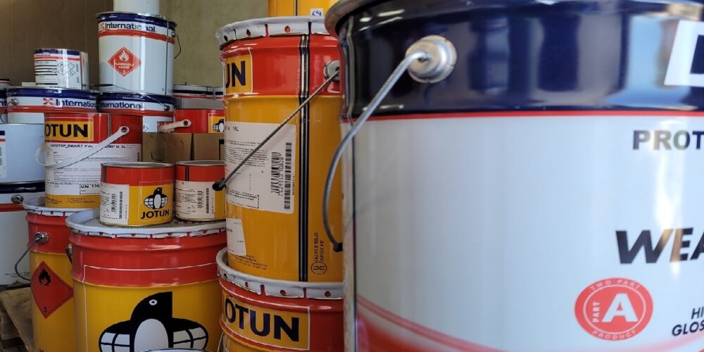 Photo of paint drums from australian paint companies - Akzo Nobel, International, Jotun, Dulux.