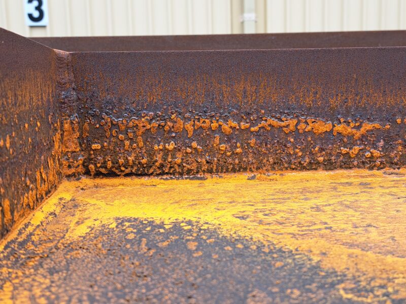 Total Corrosion Control for structural steel involves blasting off the rust and painting with epoxy paints.